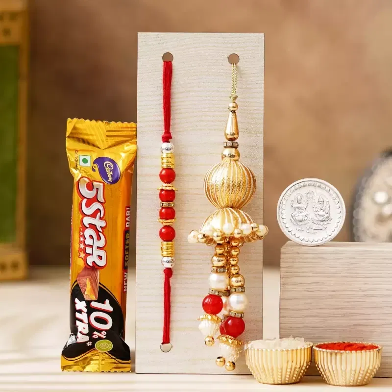 Bhaiya Bhabhi Rakhi Set  (1 Bhaiya Bhabhi Rakhi Set, 1 Coin, Chocolate, Greeting Card, Roli & Chawal)