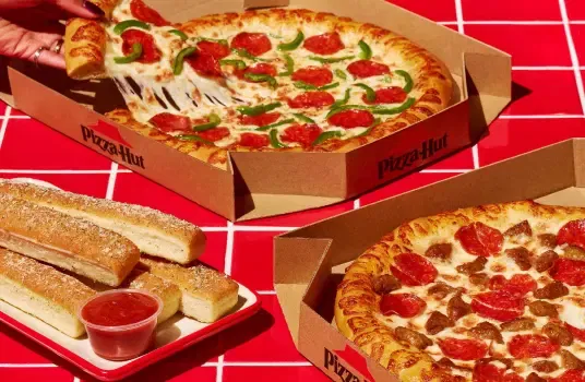 Supreme Family Meal: 2 Medium Pizzas + 2 side items + 1.25 L Pepsi