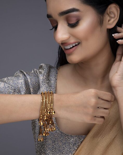 Rubans Set of 4 Women Stone-Studded Slip-On Bangles AJIO sale