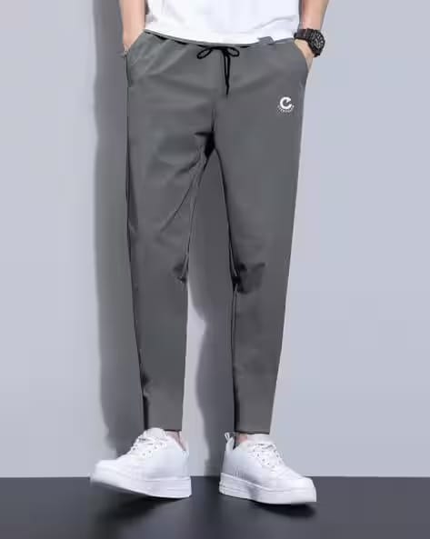EYEBOGLER Men Graphic Print Track Pants with Elasticated Drawstring Waist AJIO sale