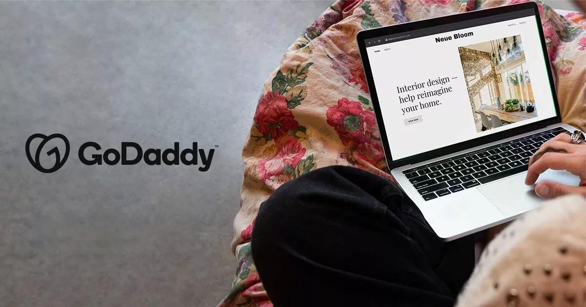 GoDaddy's own published SSL certificate page photograph, showing a secured https site being viewed on a laptop - the SSL certificate subject the title names