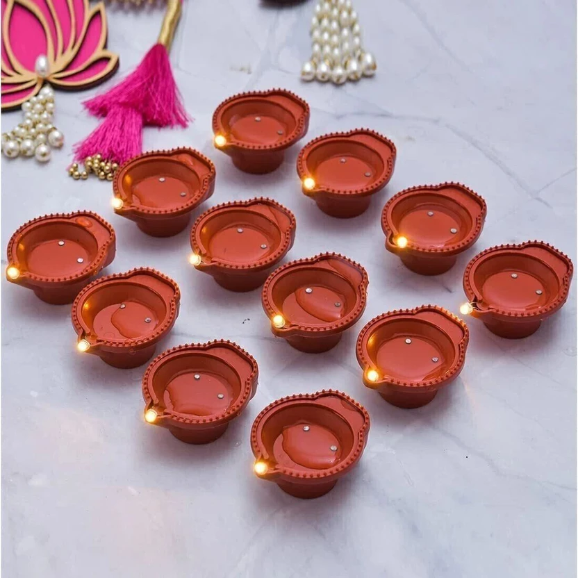 MoviQ LED Water Sensor Diya (Model No. WS12) Plastic (Pack of 12) Table Diya Set Flipkart sale