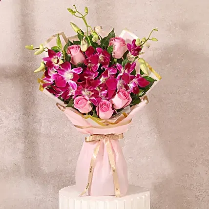 FNP Rosy Orchid Celebration Bouquet
