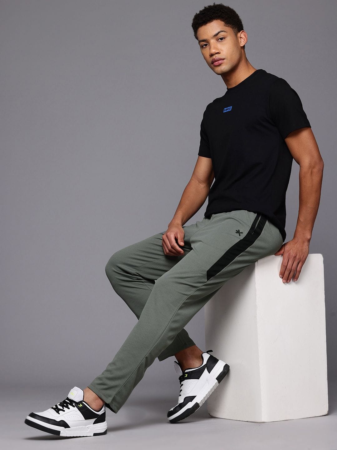 HRX by Hrithik Roshan HRX by Hrithik Roshan Men Striped Cricket Track Pants Myntra sale