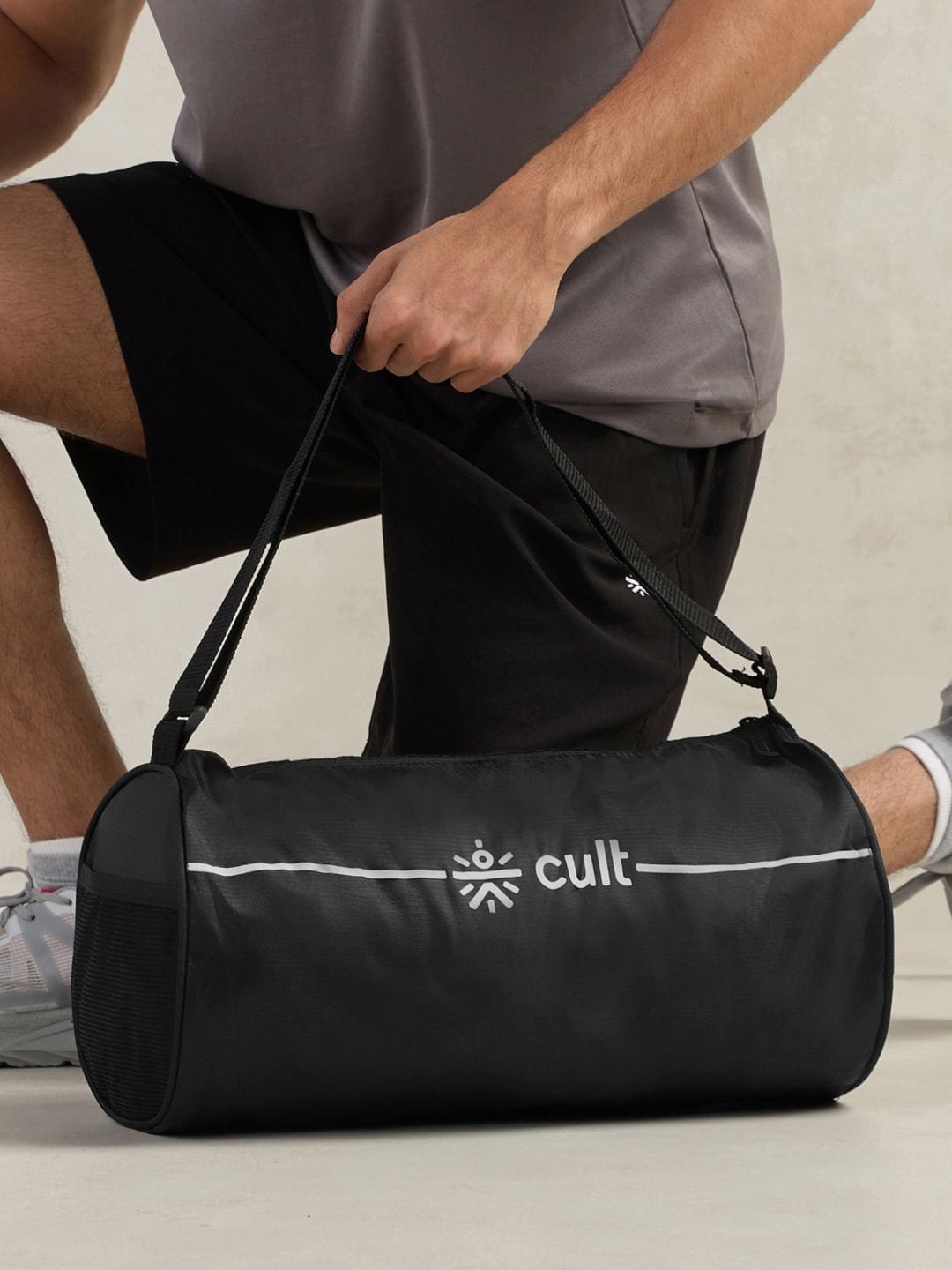 CULT Black Duffle Bag Unisex Adjustable Strap Mesh pocket Gym & Sport Bag 12 L Myntra sale