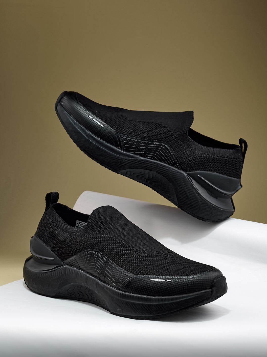 Campus Men FLYNN Mesh Textured Slip-On Walking Sneakers Myntra sale