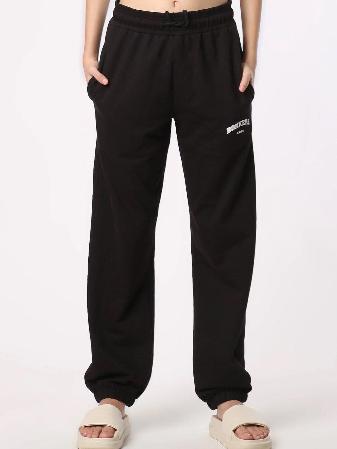 Bonkers Corner Women Black Logo Printed Mid-Rise Joggers Myntra sale