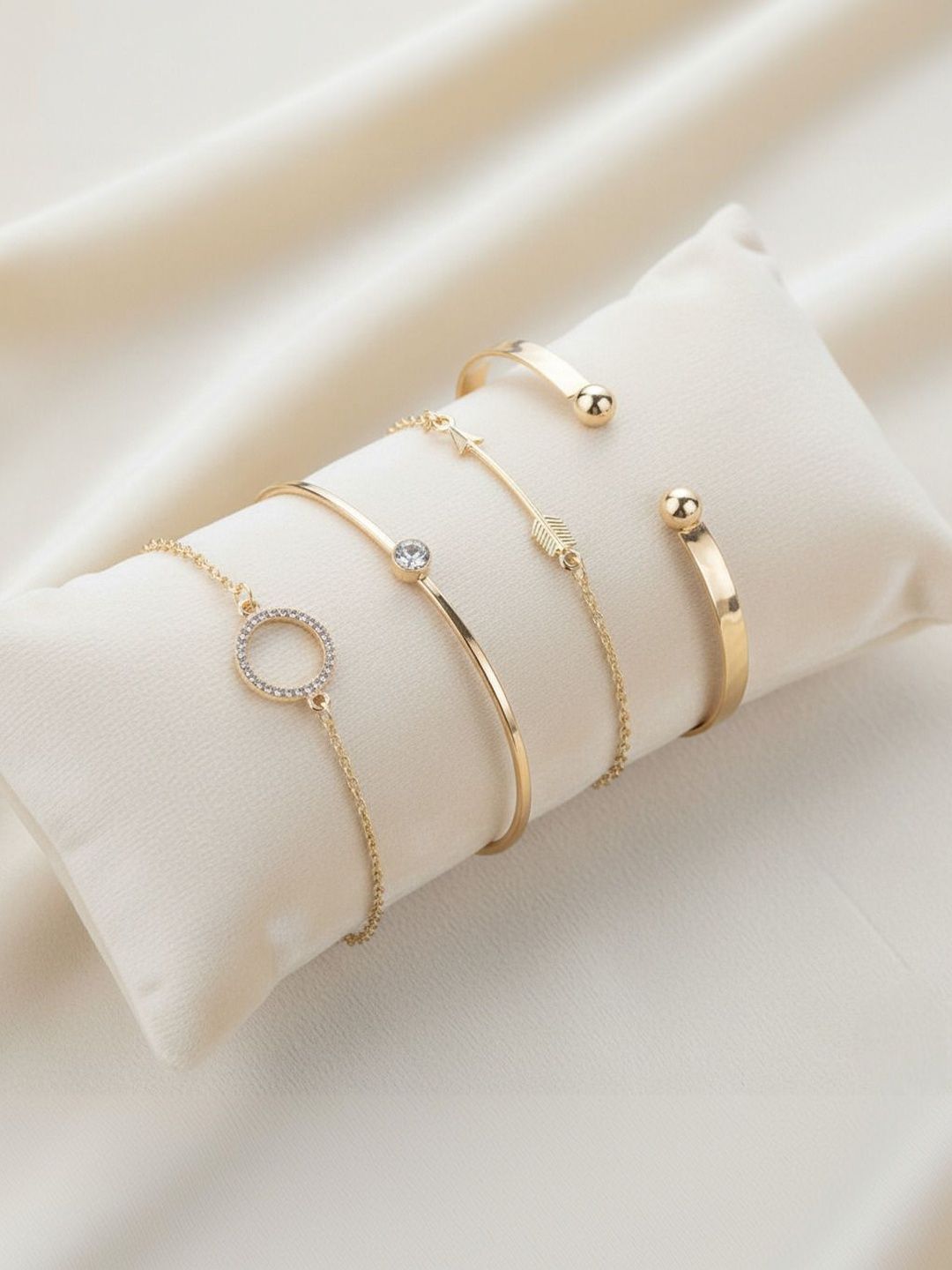 DressBerry Women 4 Cubic Zirconia Gold-Plated Cuff Bracelet Myntra sale