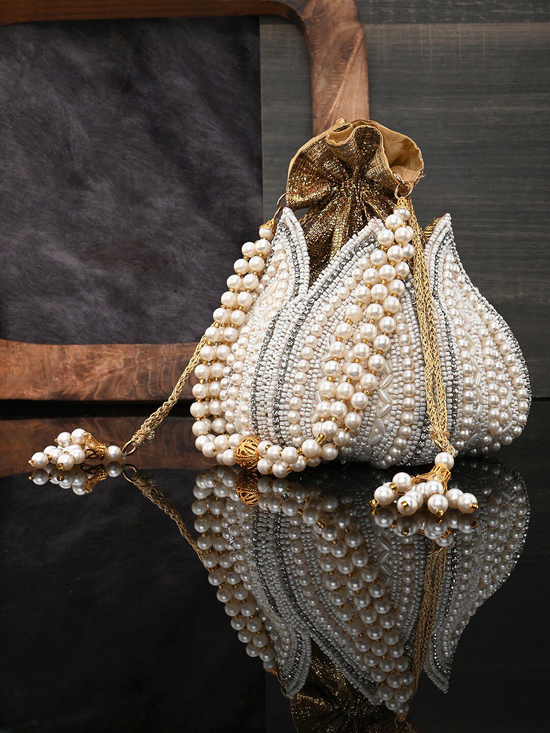 Anouk Anouk Gold-Toned Embellished Potli Cutch Myntra sale