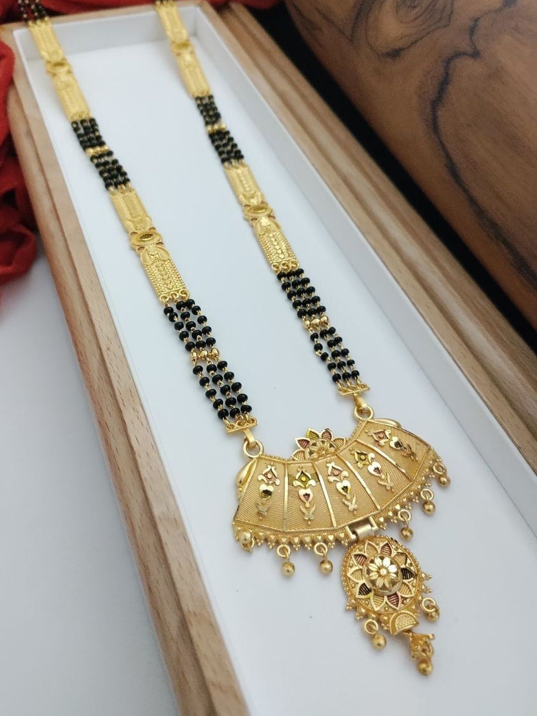 OM KRISHIV COLLECTION Gold-Plated Mangalsutra Myntra sale